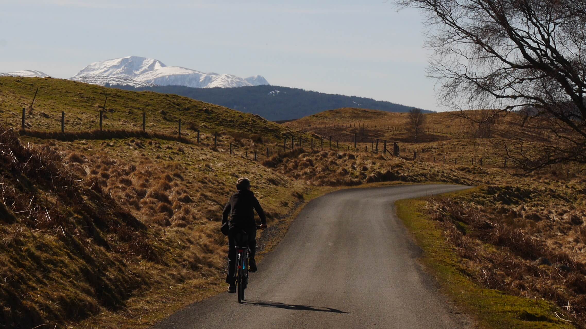 A cyclist on a single track road near Loch Rannoch